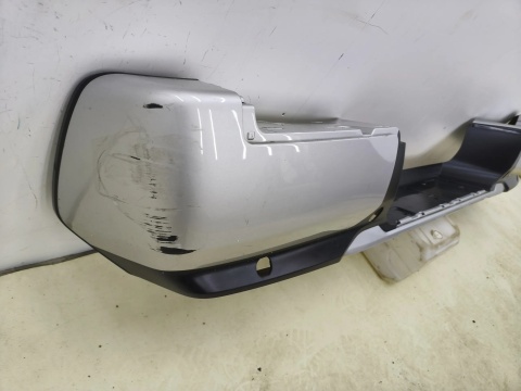 Zderzak tylny Mitsubishi L200 5 V 19-23r. Lift tył 4XPDC stopień 6410D647ZZ