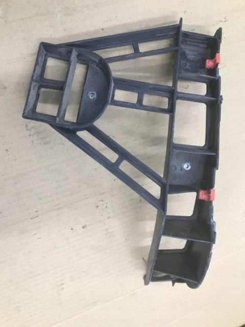 Ślizg OPEL VECTRA C KOMBI 02-08r. mocowanie wspornik uchwyt zderzaka lewe tylne 13100355