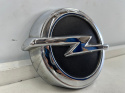 Klamka Opel Corsa E przycisk znaczek emblemat mikrostyk klapy bagażnika 563697283