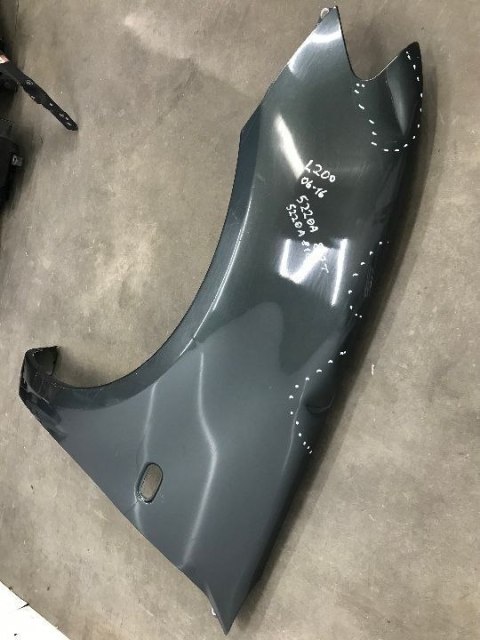 Błotnik Mitsubishi L200 lewy przedni 2006-2016r. 5220A817T Błotnik Mitsubishi L200 lewy przedni 2006-2016r. 5220A817T
