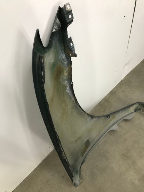 Błotnik Mitsubishi L200 lewy przedni 2006-2016r. 5220A817T Błotnik Mitsubishi L200 lewy przedni 2006-2016r. 5220A817T