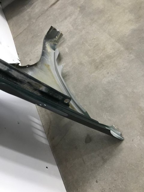 Błotnik Mitsubishi L200 lewy przedni 2006-2016r. 5220A817T Błotnik Mitsubishi L200 lewy przedni 2006-2016r. 5220A817T