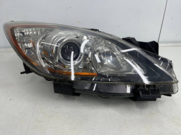 Lampa reflektor Mazda 3 II BL przed liftingiem prawa przednia soczewka H7 ślizgi 09-11r.